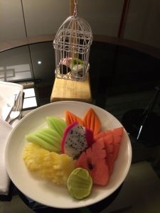 Fruit platter I'd asked for on arrival... with choccies in a mini bird cage!
