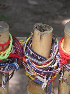 Memorials left on the fences protecting the mass graves
