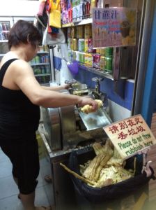 Sugar cane being juiced