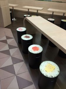 Seats at the sushi shop in Funan Mall