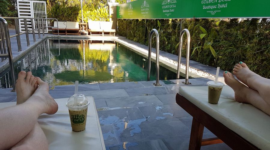 Relaxing by the pool